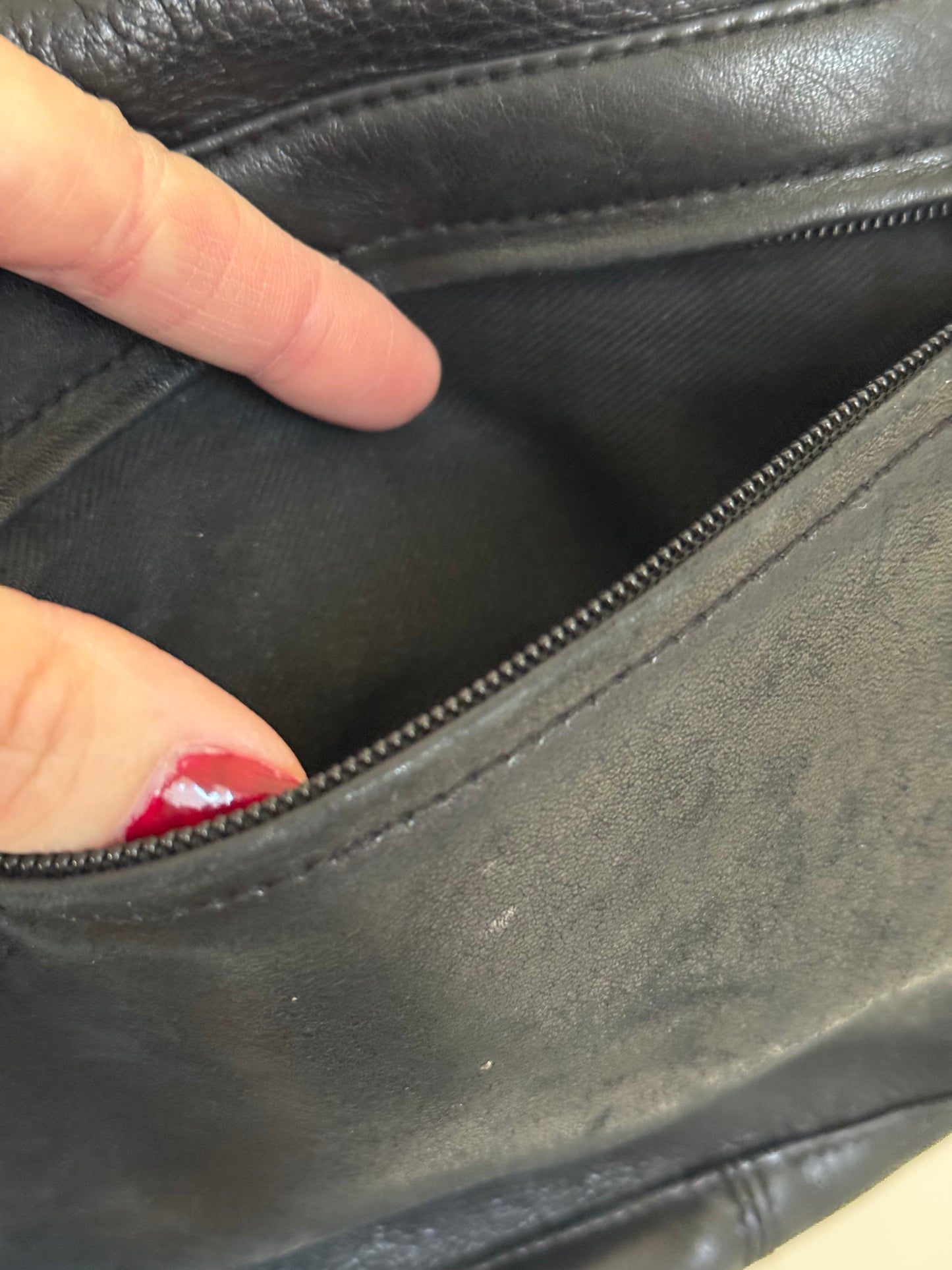 Pebbled Leather Fold Over Handbag in Black